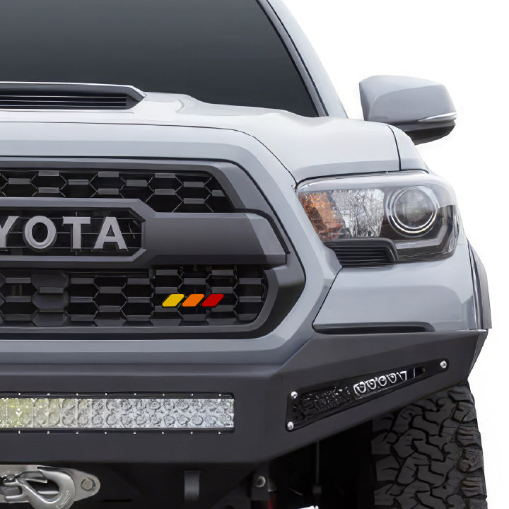 Which Custom Tacoma Grille Badges Make a Bold Statement