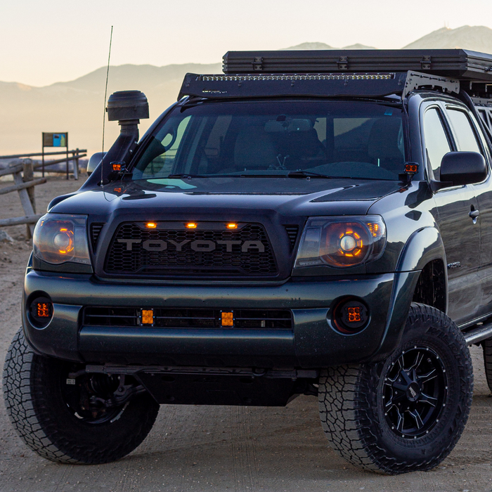 heretics ba-2 pod light being used as ditch lights on a toyota tacoma